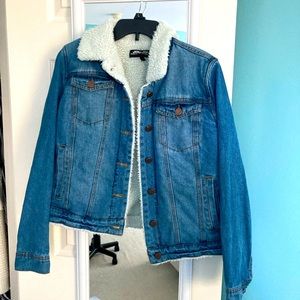 Jean jacket with white fur lining